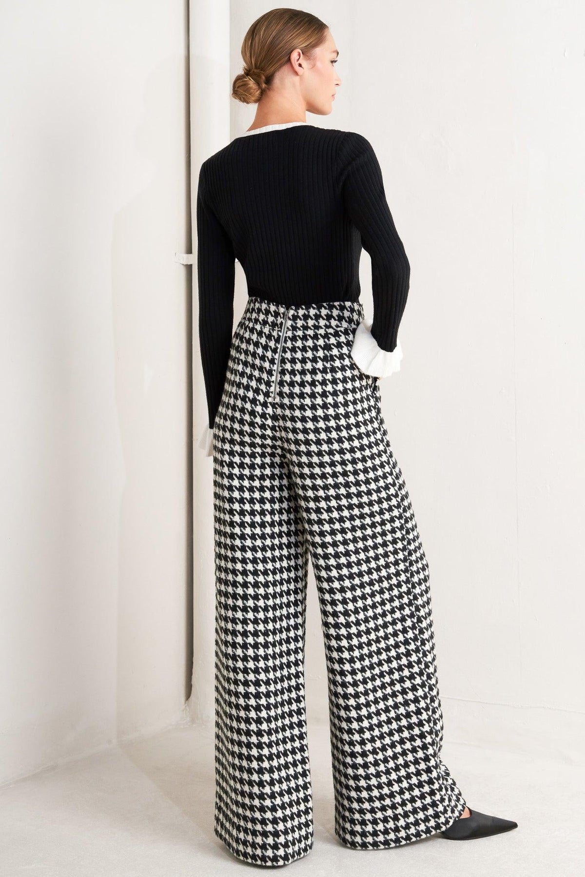 Flying Tomato Metro Icon woven houndstooth pants in black and white, featuring a stylish pattern and tailored fit.