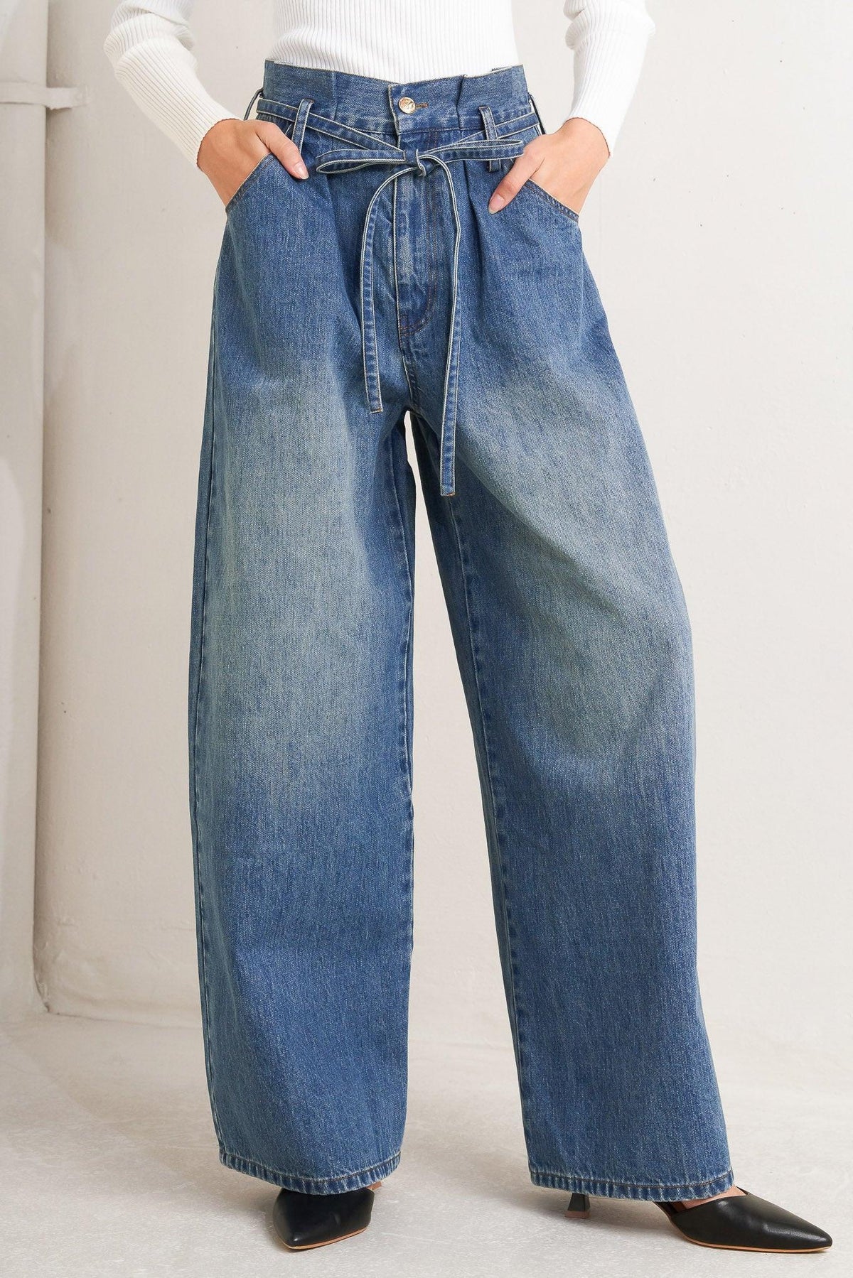 Flying Tomato Everyday Cinch Denim Pants in indigo, showing a close-up of the classic fit and durable denim fabric.