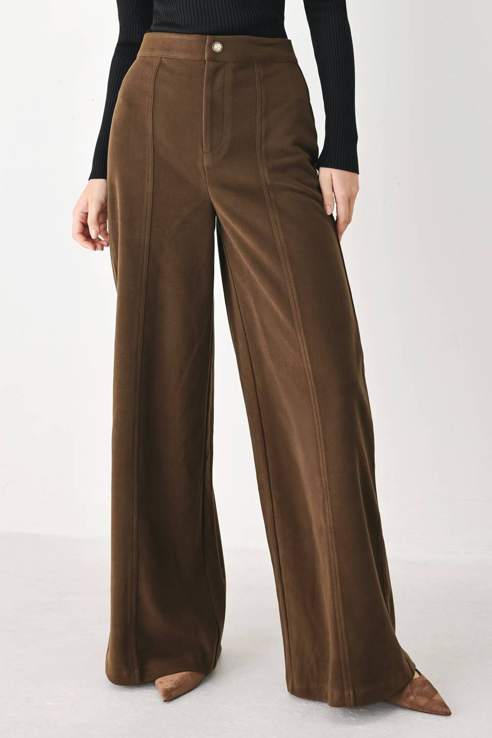 Flying Tomato Cocoa After Hours wide leg pants in brown, displayed on a hanger with a relaxed fit and flowy fabric.
