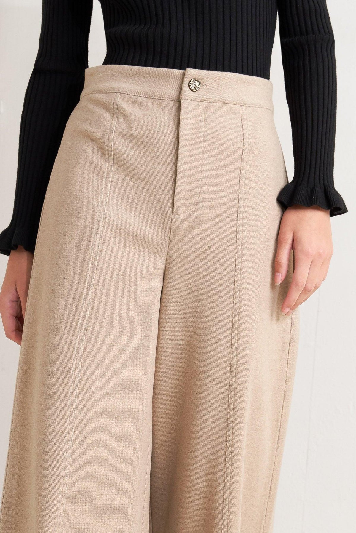 Flying Tomato modern mocha knit pants featuring a stylish corset-inspired design, shown in a close-up view.