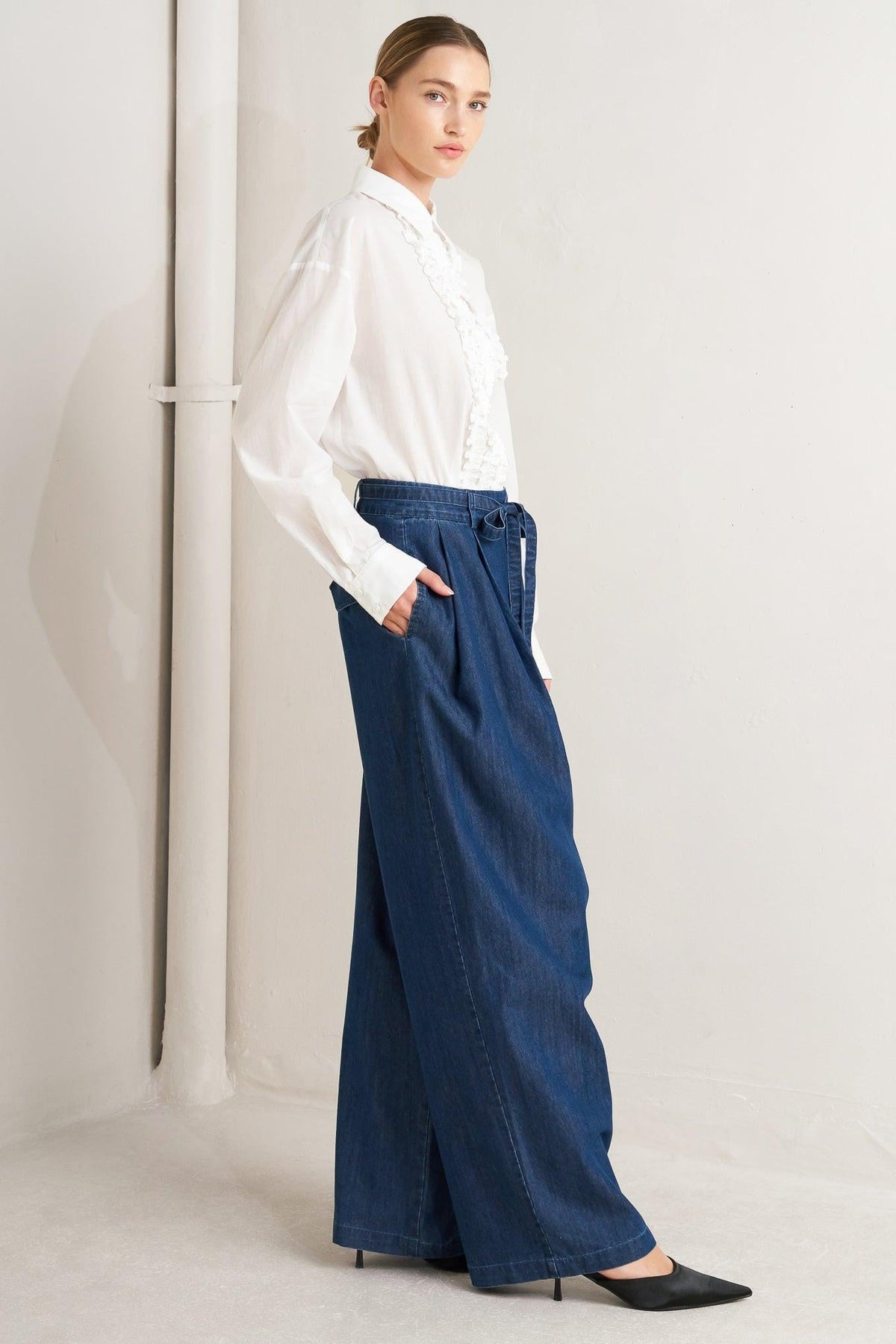 Flying Tomato relaxed tailored denim loose fit pants in indigo, showing the front view with pockets and casual fit.