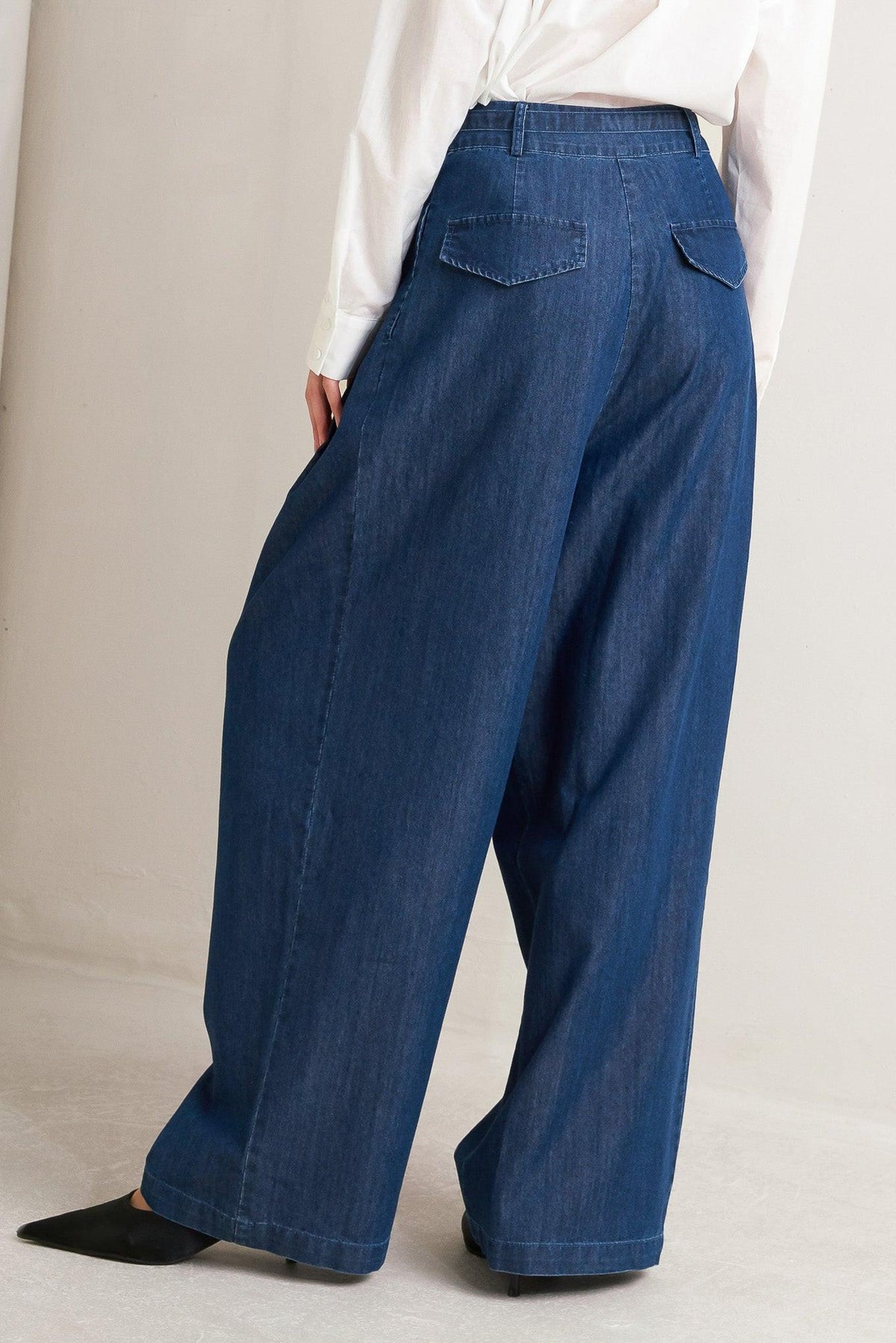 Relaxed tailored denim pants by Flying Tomato in indigo, loose fit with a casual, comfortable style.