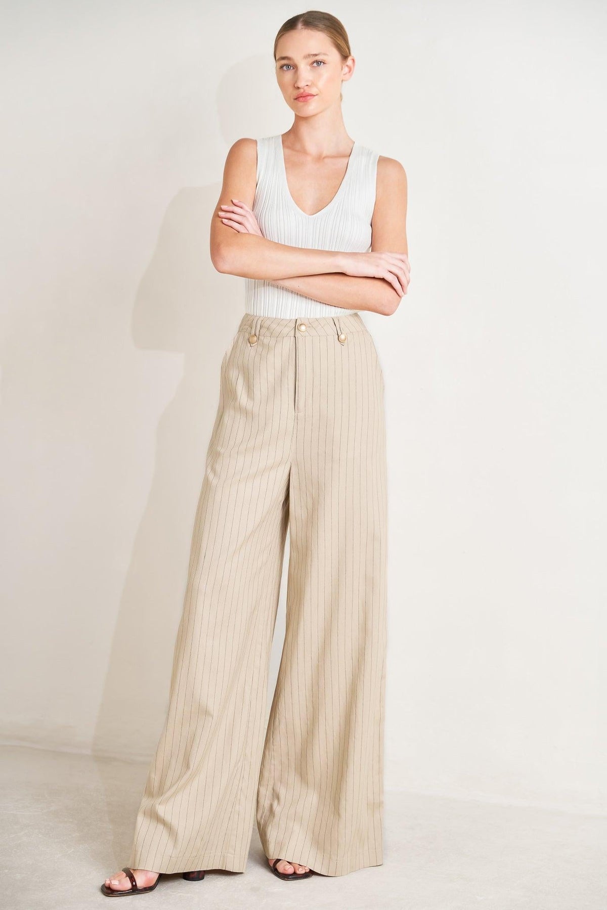 Flying Tomato The Boardroom Edit woven pants in taupe and black, showing a tailored fit with a waistband and side pockets.