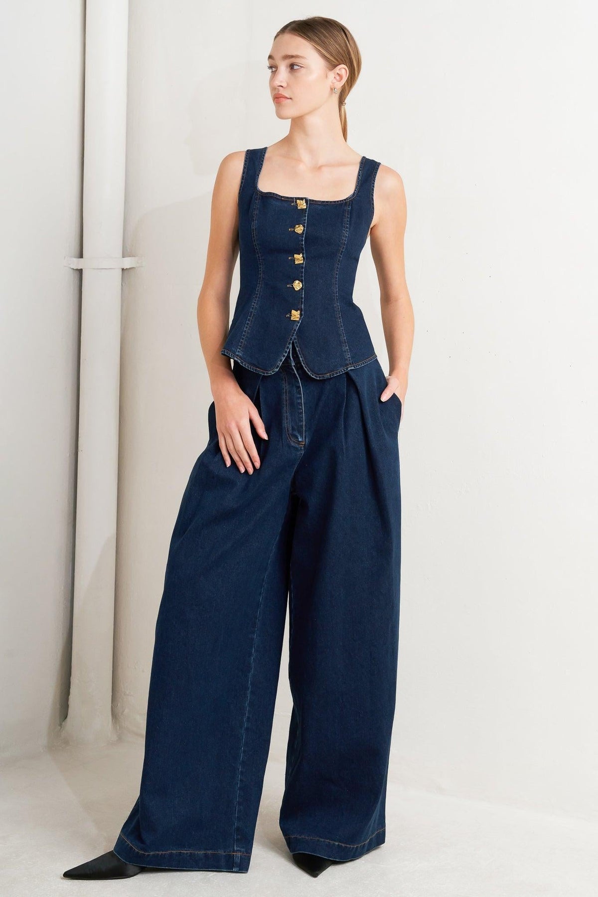 Flying Tomato Quiet Luxe denim pants, stylish blue jeans with a relaxed fit, displayed on a neutral background.