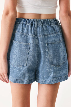 Light indigo vintage bandana denim shorts from Flying Tomato with distressed details and rolled cuffs.