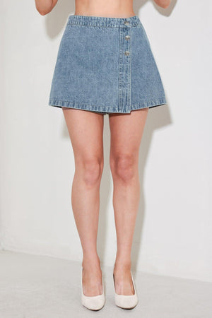 Flying Tomato street muse denim skort showing front view with distressed denim fabric and casual style.