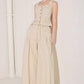 Light beige Daylight Groove woven pants by Flying Tomato, showcasing relaxed fit and textured fabric detail.