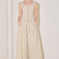 Light beige Flying Tomato Daylight Groove woven pants with a relaxed fit and textured fabric, shown on a model.