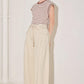 Light beige Flying Tomato Daylight Groove woven pants with a relaxed fit and woven texture, displayed on a neutral background.