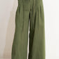 Flying Tomato daylight groove woven pants in olive green, featuring a relaxed fit and textured woven fabric.