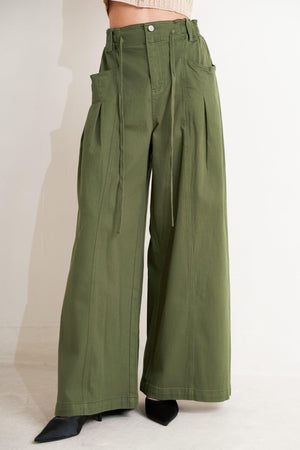 Flying Tomato daylight groove woven pants in olive green, featuring a relaxed fit and textured woven fabric.