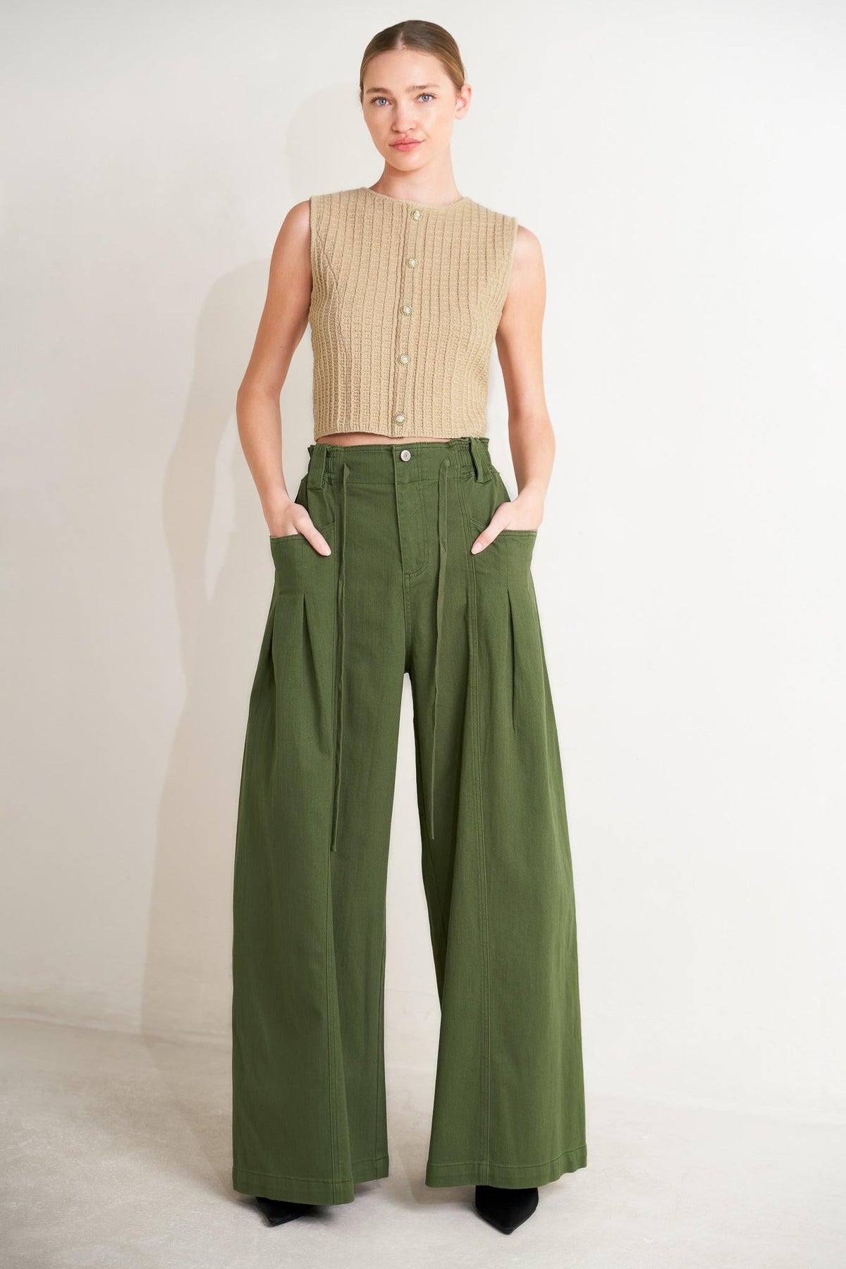 Flying Tomato daylight groove woven pants in olive color, featuring a relaxed fit and woven fabric for casual wear.