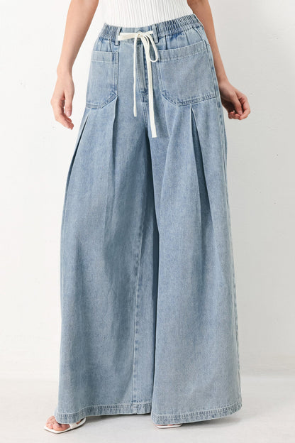 Flying Tomato Cloud Wash Palazzo Denim Pants in light denim with wide-leg style and relaxed fit.