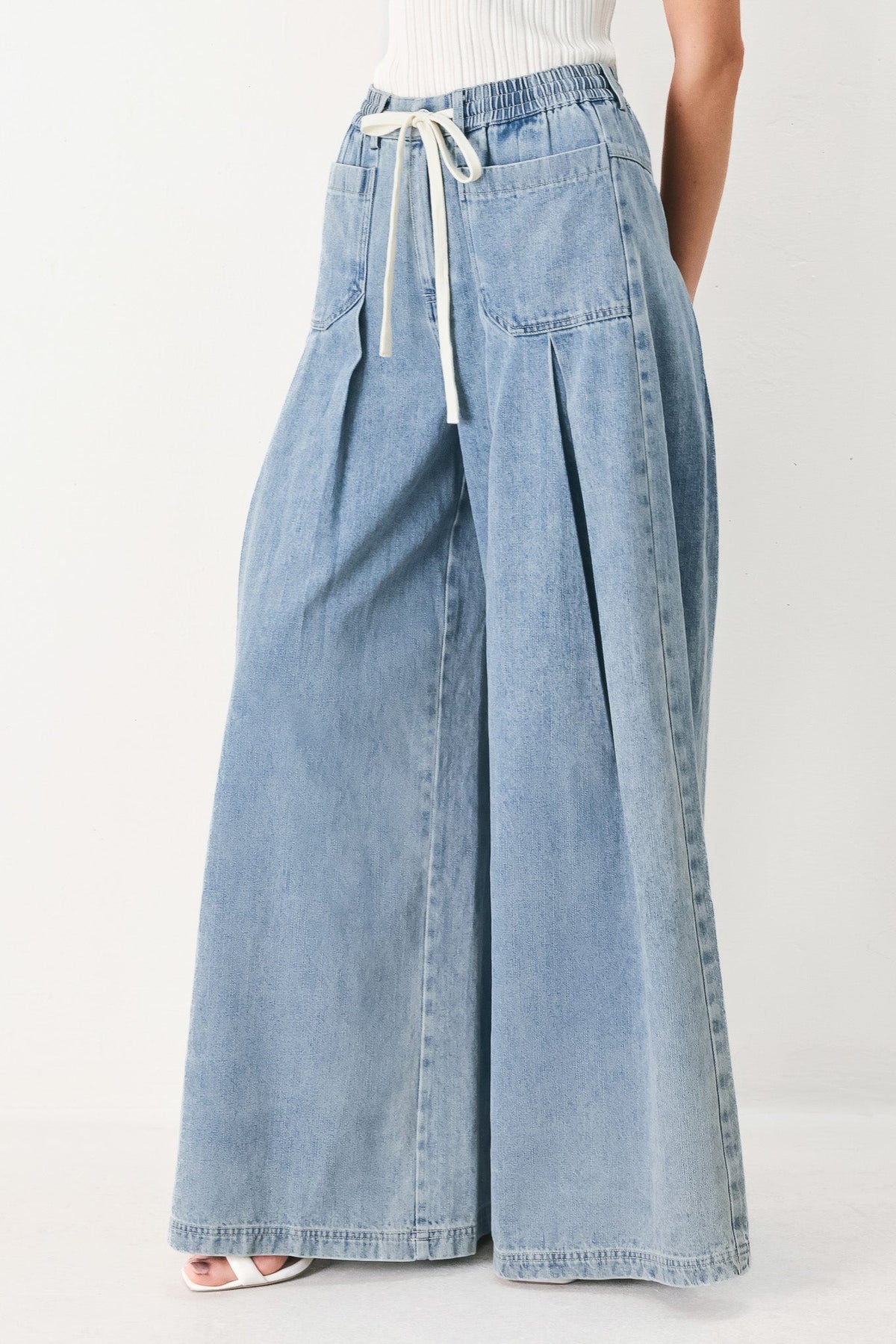 Flying Tomato Cloud Wash Palazzo Denim Pants in light denim, featuring a relaxed fit with wide-leg style and stylish waistband.