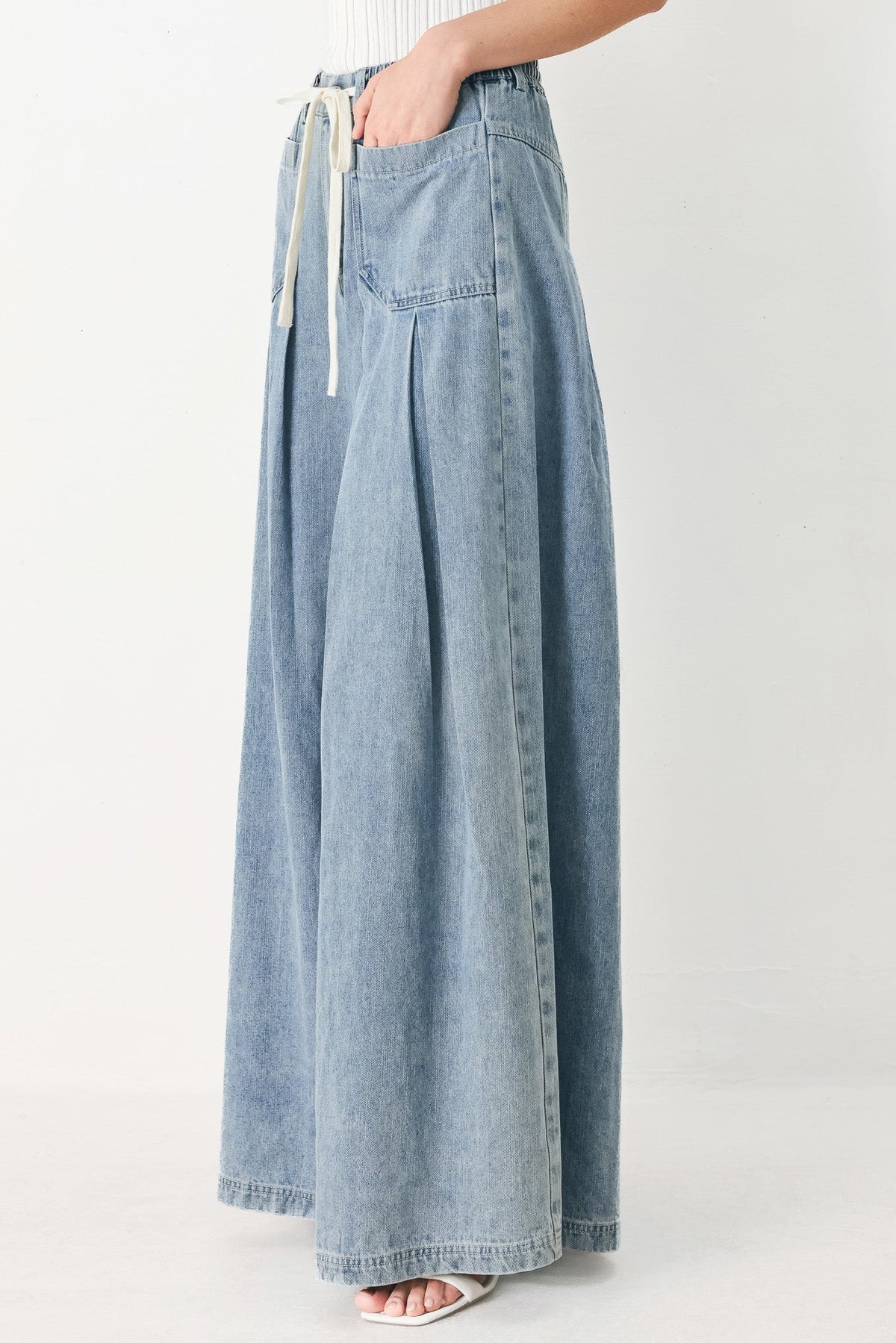 Flying Tomato Cloud Wash Palazzo Denim Pants in light denim, featuring wide-leg style and relaxed fit.
