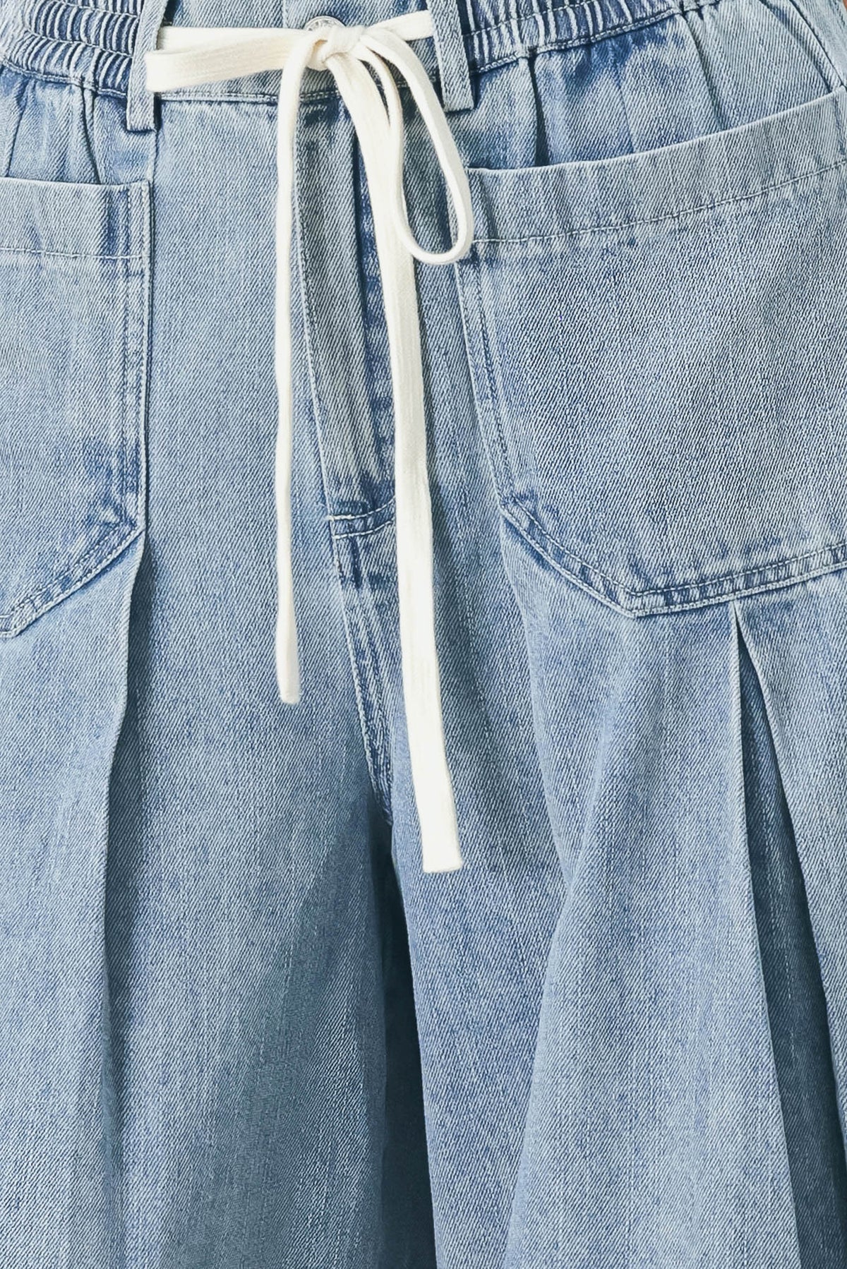Flying Tomato Cloud Wash Palazzo Denim Pants in light denim with a relaxed, wide-leg fit and subtle fading.