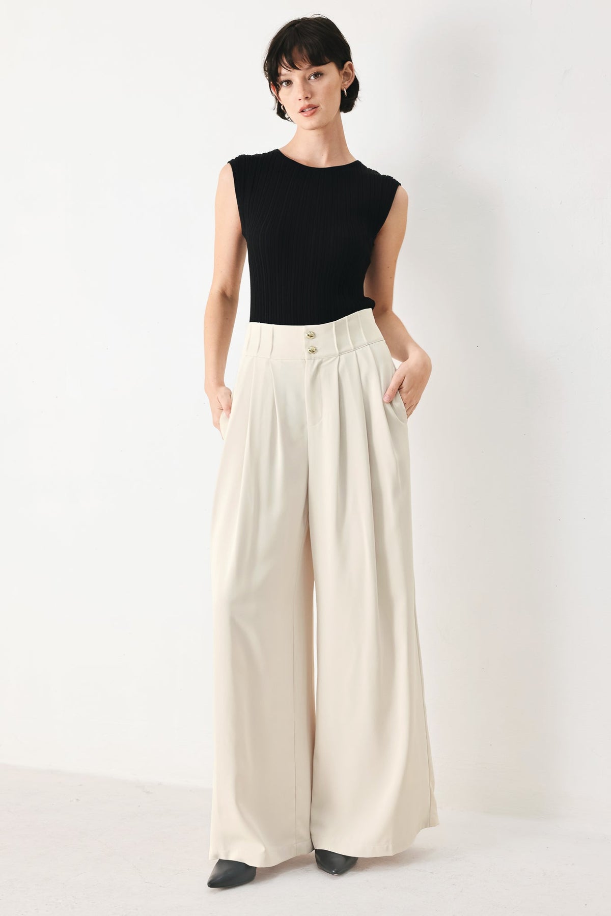 Flying Tomato modern minimal woven pants in neutral color, featuring a sleek fit and woven fabric, displayed on a plain background.