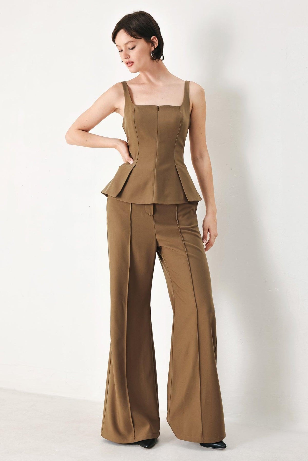 Flying Tomato Rich Silhouette woven pants in brown, showcasing the stylish, relaxed fit and textured fabric.