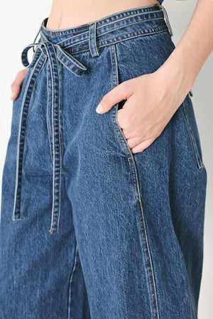 Blue Honey oversize denim pants by Flying Tomato, indigo color, featuring relaxed fit and classic jean styling.
