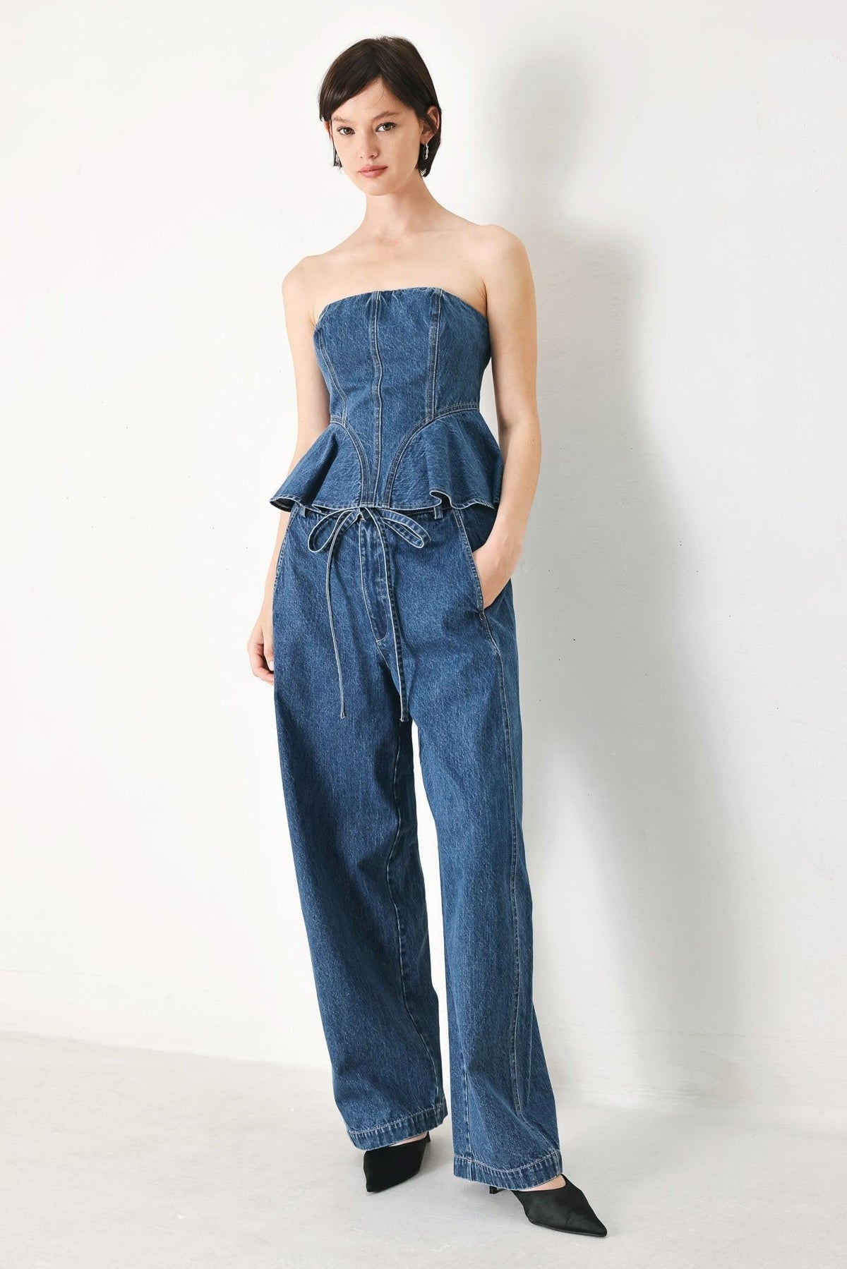 Flying Tomato blue honey oversized denim pants with relaxed fit and indigo wash, displayed on a model.