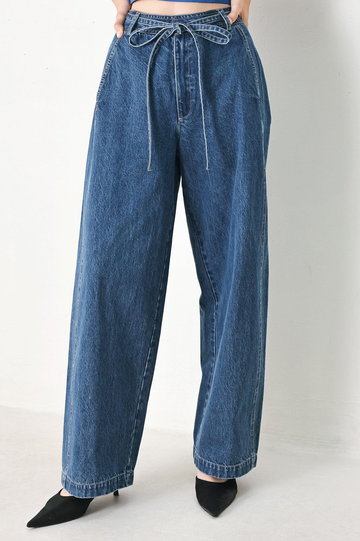 Flying Tomato blue oversized denim pants with a relaxed fit, featuring classic denim details and a stylish, casual design.