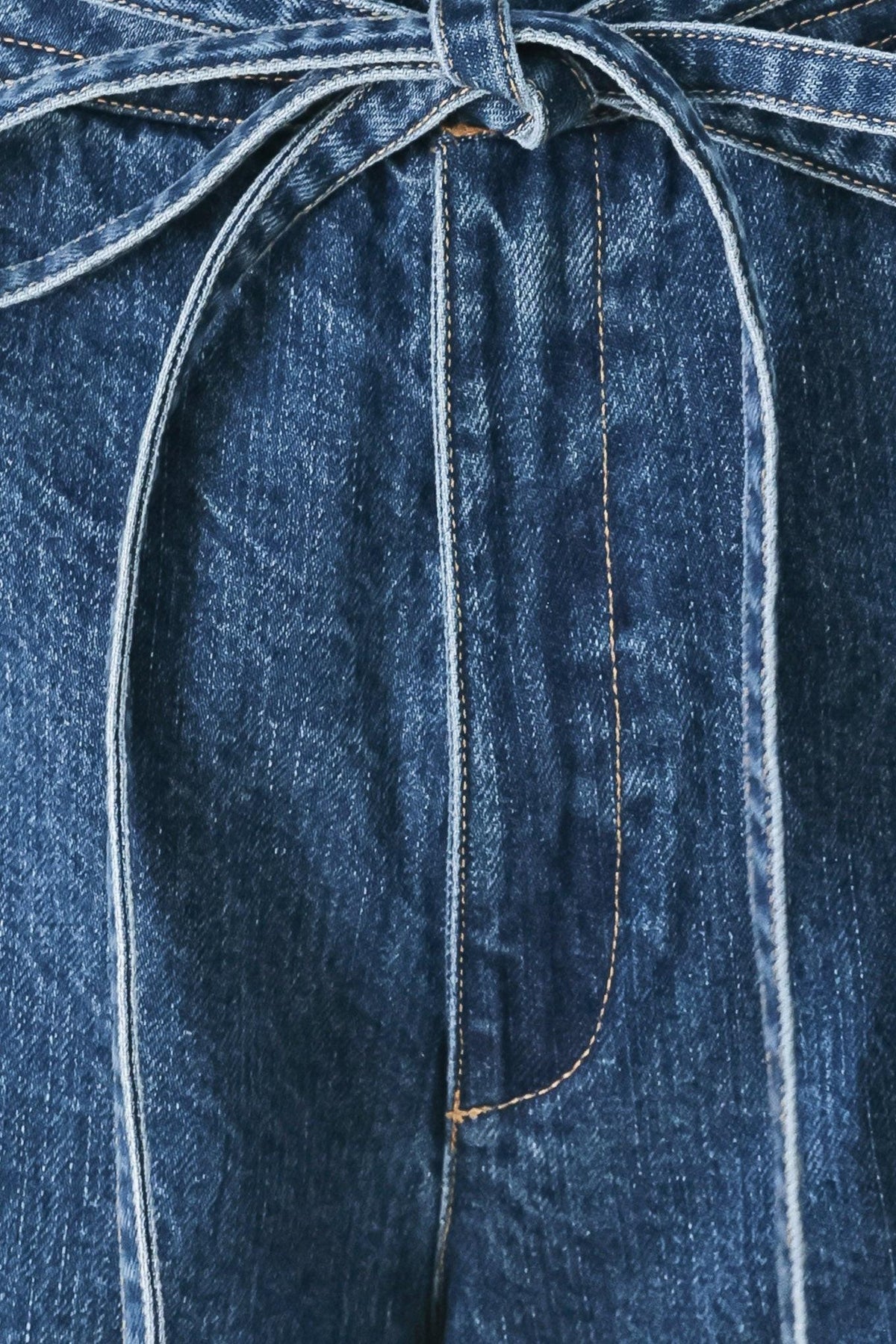 Flying Tomato blue oversized denim pants with a relaxed fit, shown in indigo color with stylish stitching and pockets.
