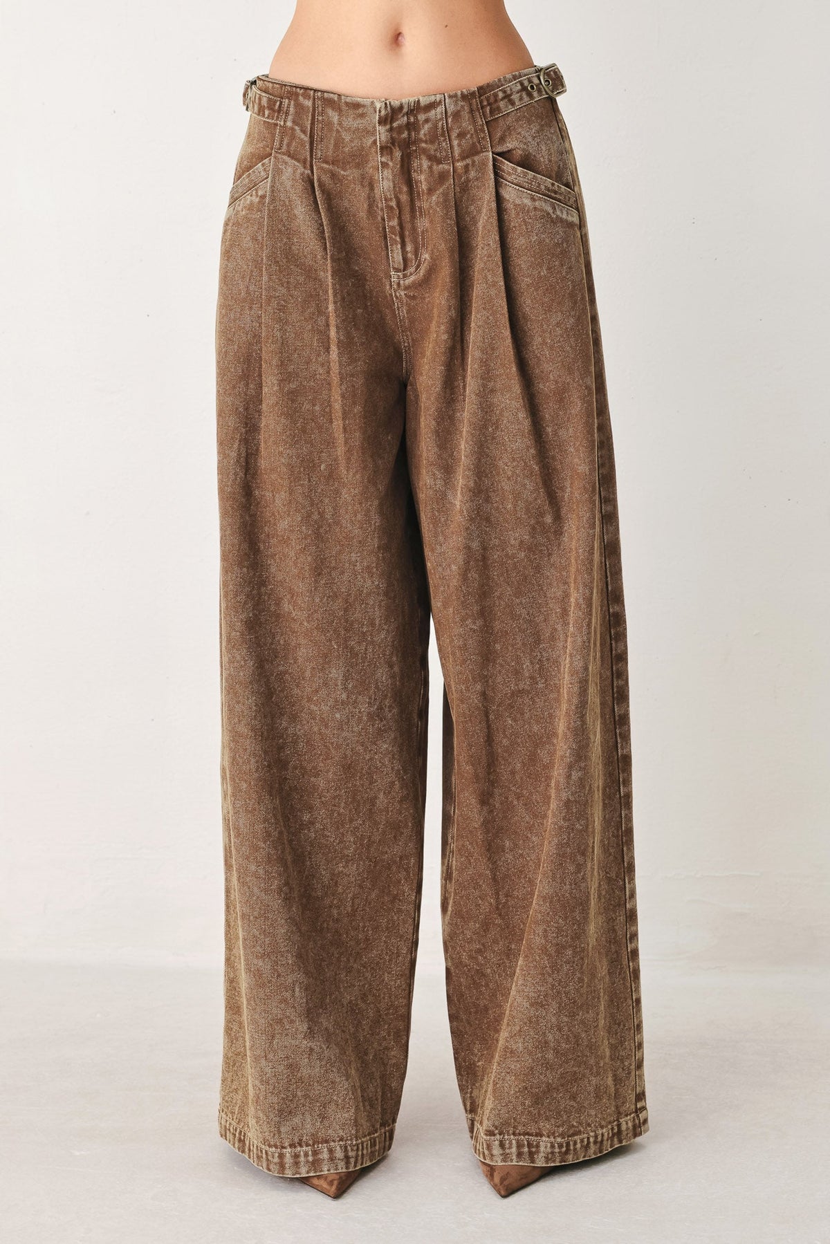 Vintage brown denim pants by Flying Tomato, showcasing classic fit and detailed stitching on a casual style.