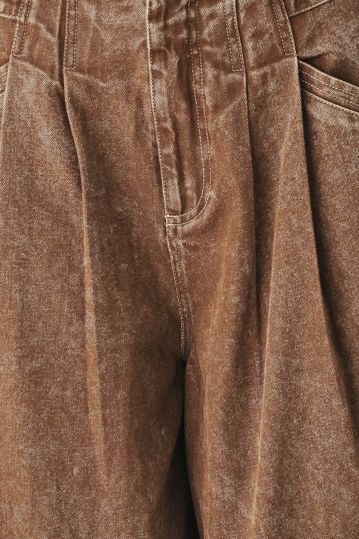 Vintage brown denim pants by Flying Tomato, showing the front view with classic stitching and relaxed fit.