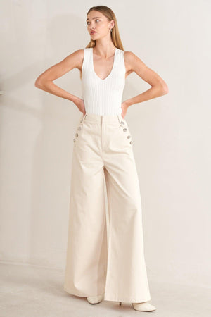 Flying Tomato Runway Tailored Woven Pants in ecru, featuring a sleek, tailored design with a comfortable fit and woven fabric.
