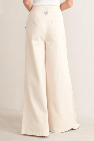 Flying Tomato Runway Tailored Woven Pants in ecru, featuring a sleek, tailored design with a comfortable woven fabric.