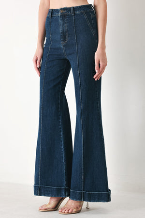 Flying Tomato Skyline Flare Denim Pants in indigo denim, showing the fitted waist and flared leg design.