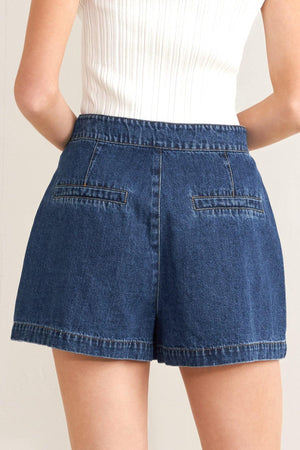 Flying Tomato Forever Stylish Denim Shorts with distressed indigo denim fabric and rolled hems, front pockets, and belt loops.