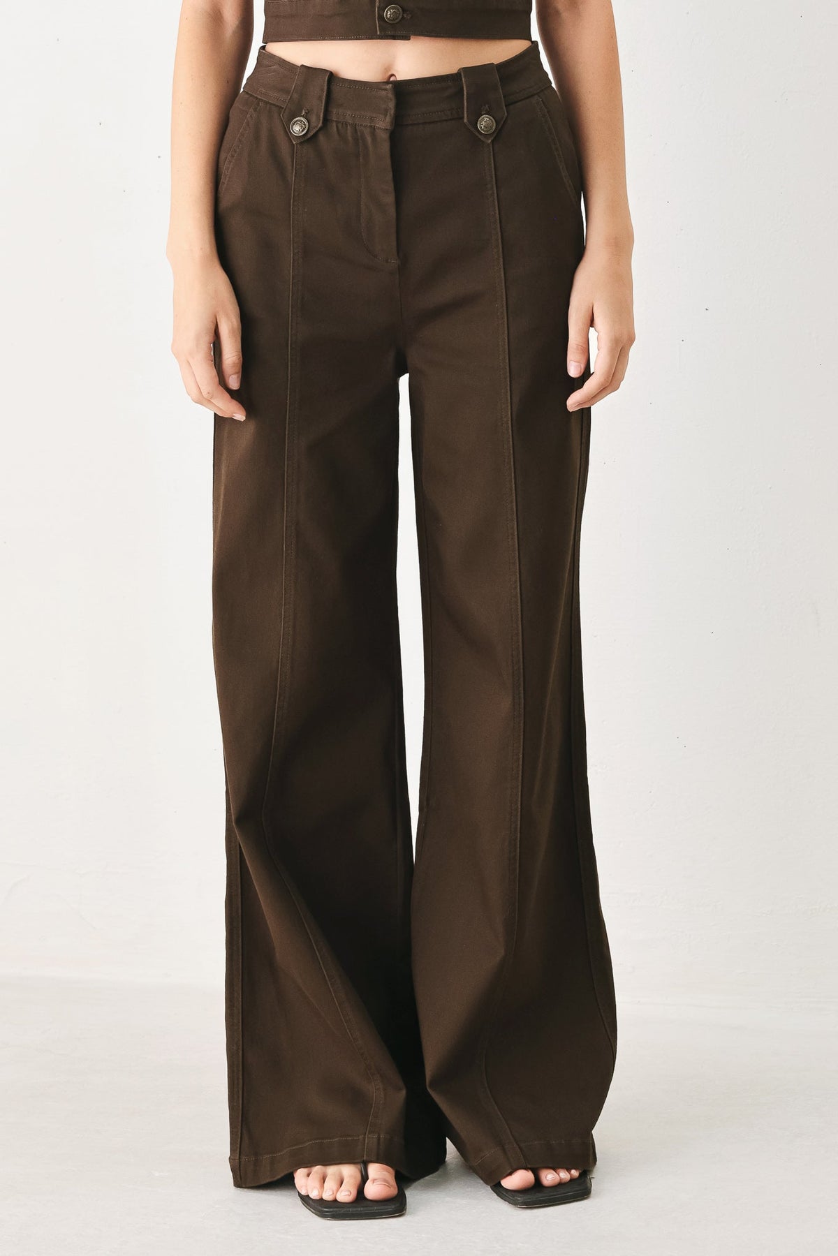 Flying Tomato Cowgirl After Dark woven pants in brown, featuring a relaxed fit and stylish design, suitable for casual wear.