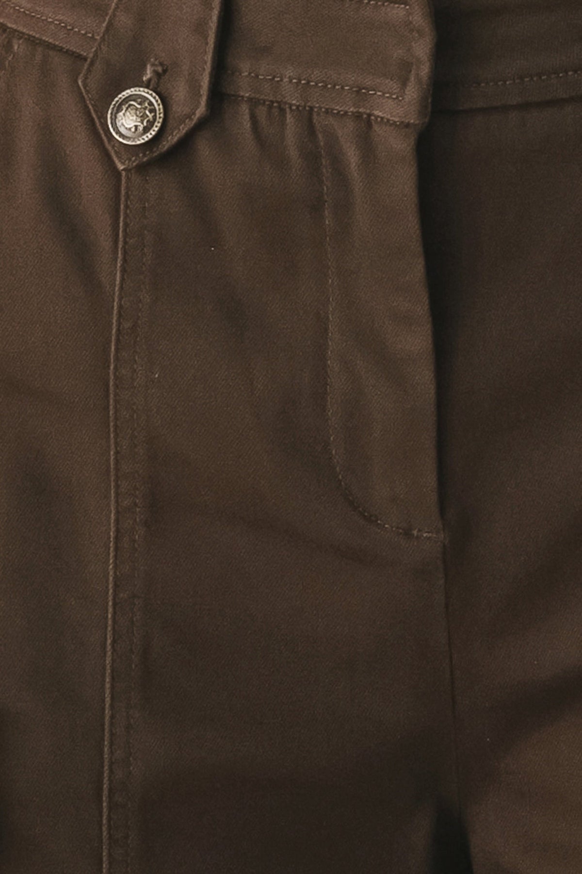 Flying Tomato Cowgirl After Dark woven pants in brown with a relaxed fit and woven texture, displayed on a hanger.
