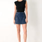 Flying Tomato Run the City denim skort in indigo, showcasing the front view with a button closure and stylish design.