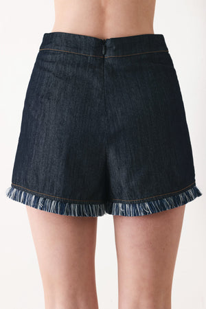 Dark denim Flying Tomato Power Soft Woven Skort with a relaxed fit, front pockets, and a comfortable stretch waistband.
