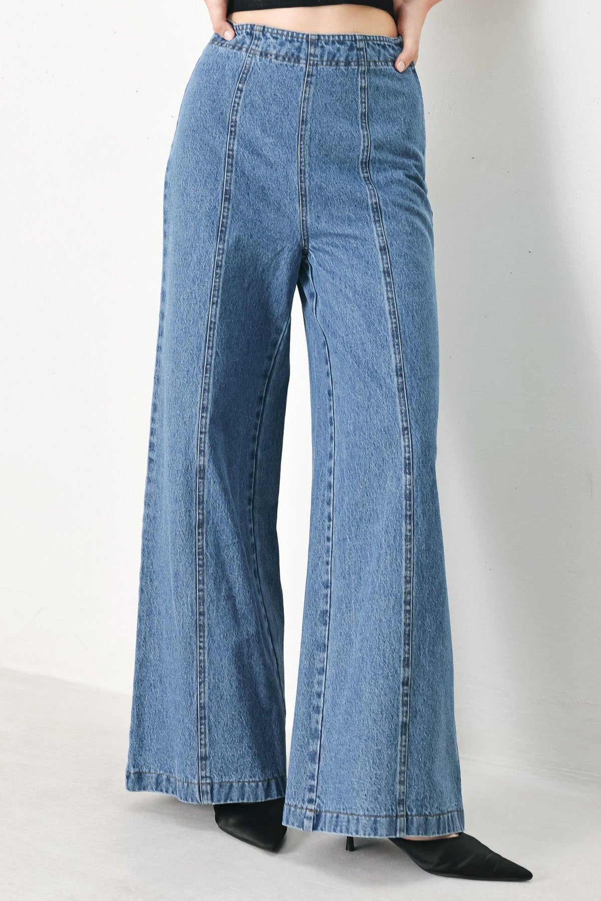 Flying Tomato City Armor denim pants in indigo, showcasing the stylish, fitted design and classic jean details.
