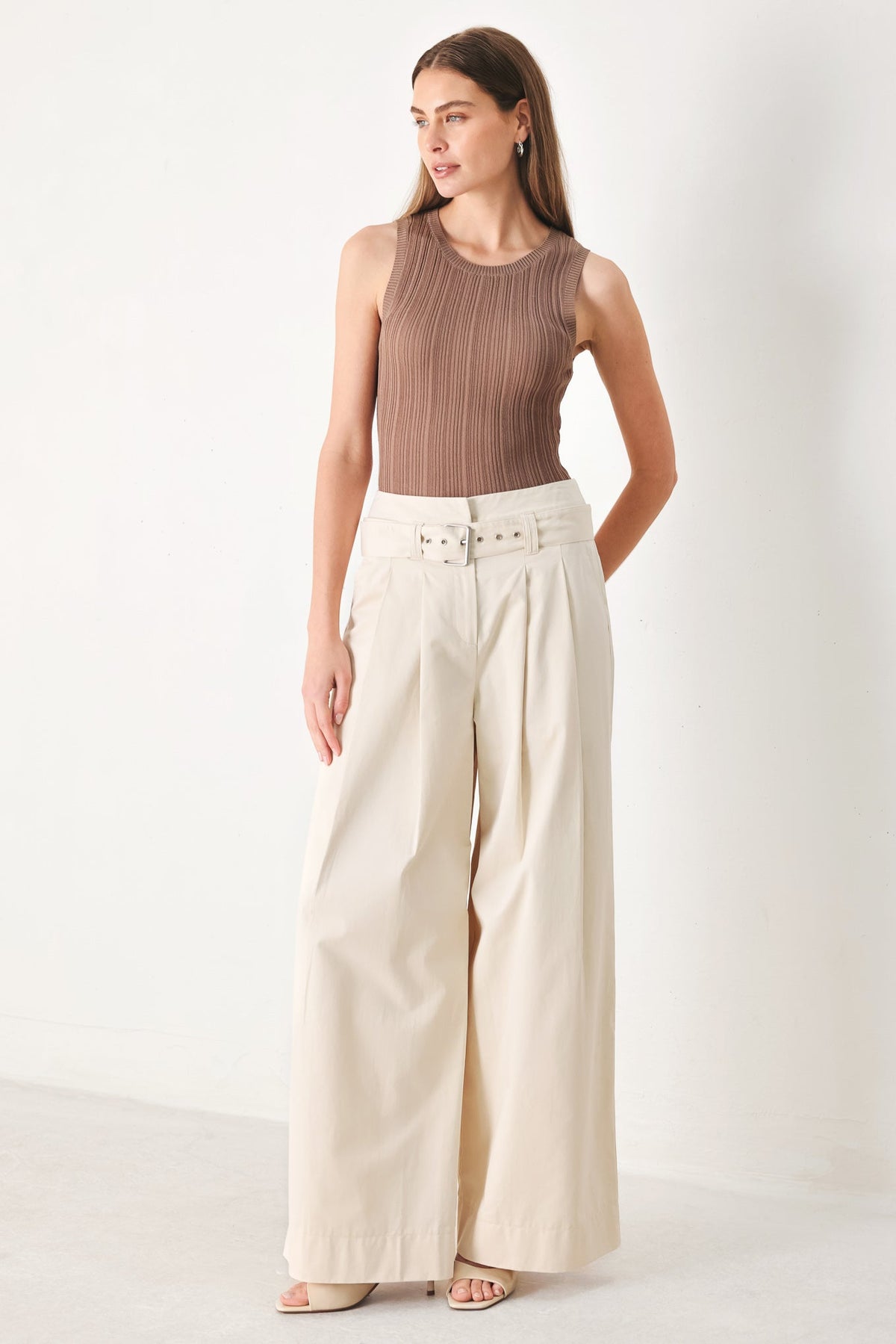 Flying Tomato Vela Wide Woven Pants in ecru, featuring a relaxed fit and woven fabric, shown on a model.