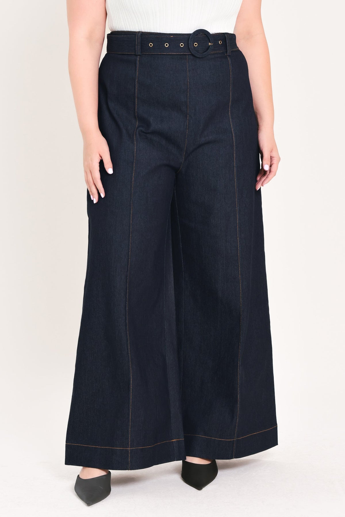 Dark denim Urban Stitch pants by Flying Tomato, featuring classic stitching and a relaxed fit, shown on a model.