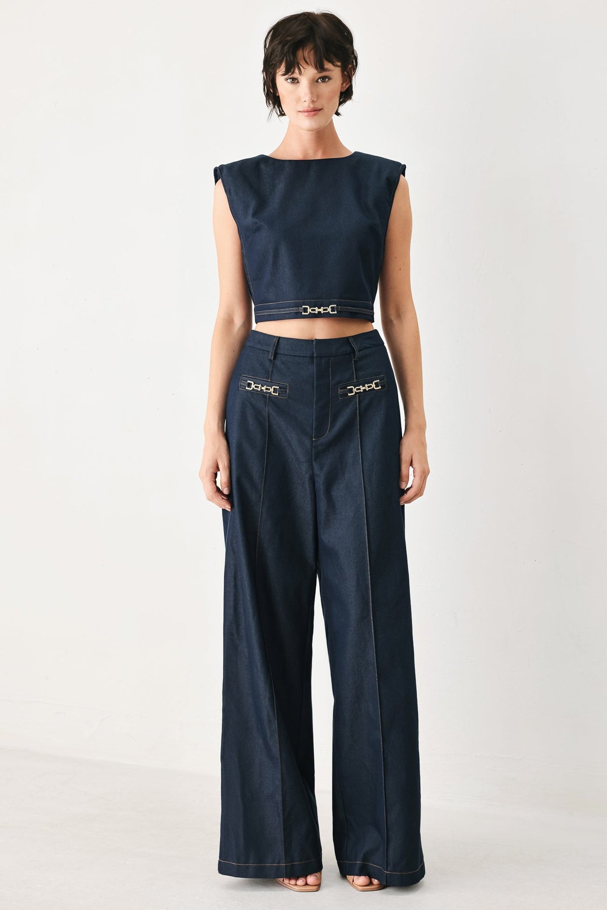 Flying Tomato Yacht Club woven wide-leg pants in indigo with a relaxed fit and flowing fabric, displayed on a hanger.
