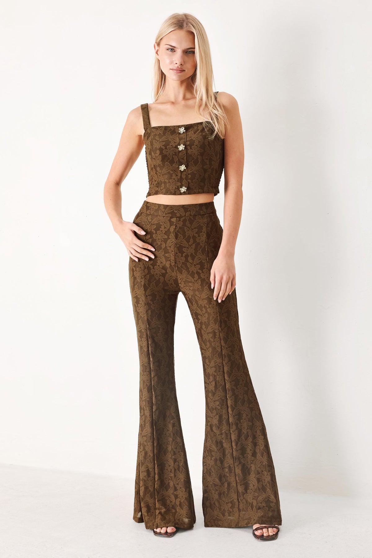 Flying Tomato Moonlight Boho woven pants in brown with a relaxed fit and intricate woven design, displayed on a neutral background.