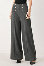 Charcoal and white pinstripe woven pants by Flying Tomato, showcasing a modern tailored design with a fitted waistband.