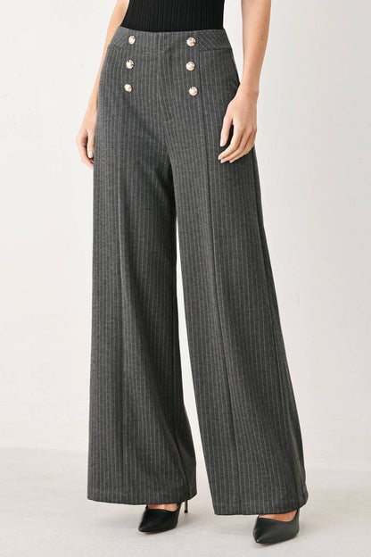 Charcoal and white pinstripe woven pants by Flying Tomato, showcasing a modern tailored design with a fitted waistband.