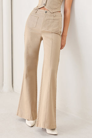 Flying Tomato Portofino woven pants in taupe, featuring a relaxed fit and textured fabric, shown on a model.