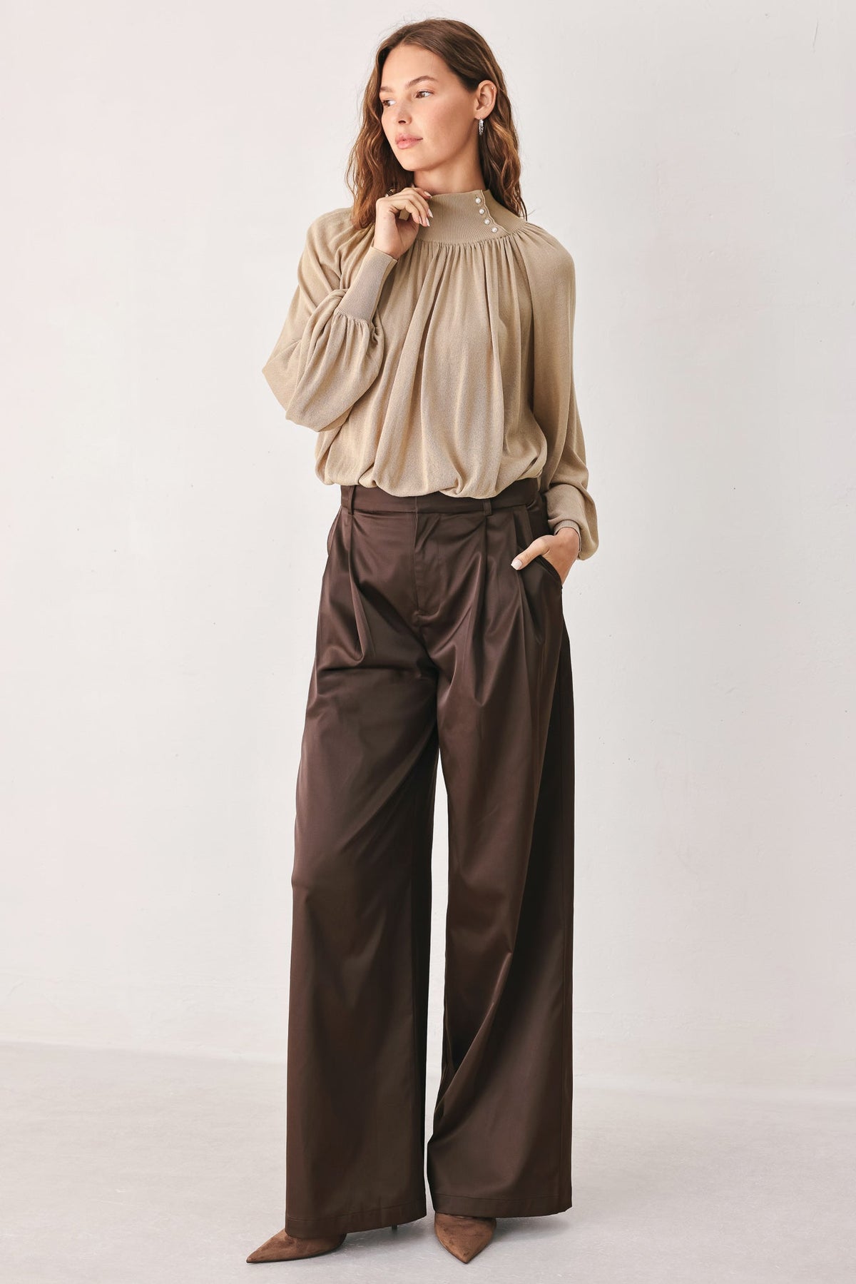 Brown relaxed-fit woven pants by Flying Tomato, showcasing a comfortable, casual design with a relaxed silhouette.