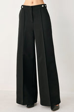 Black Power Palazzo woven pants by Flying Tomato, featuring wide-leg design and intricate woven patterns.