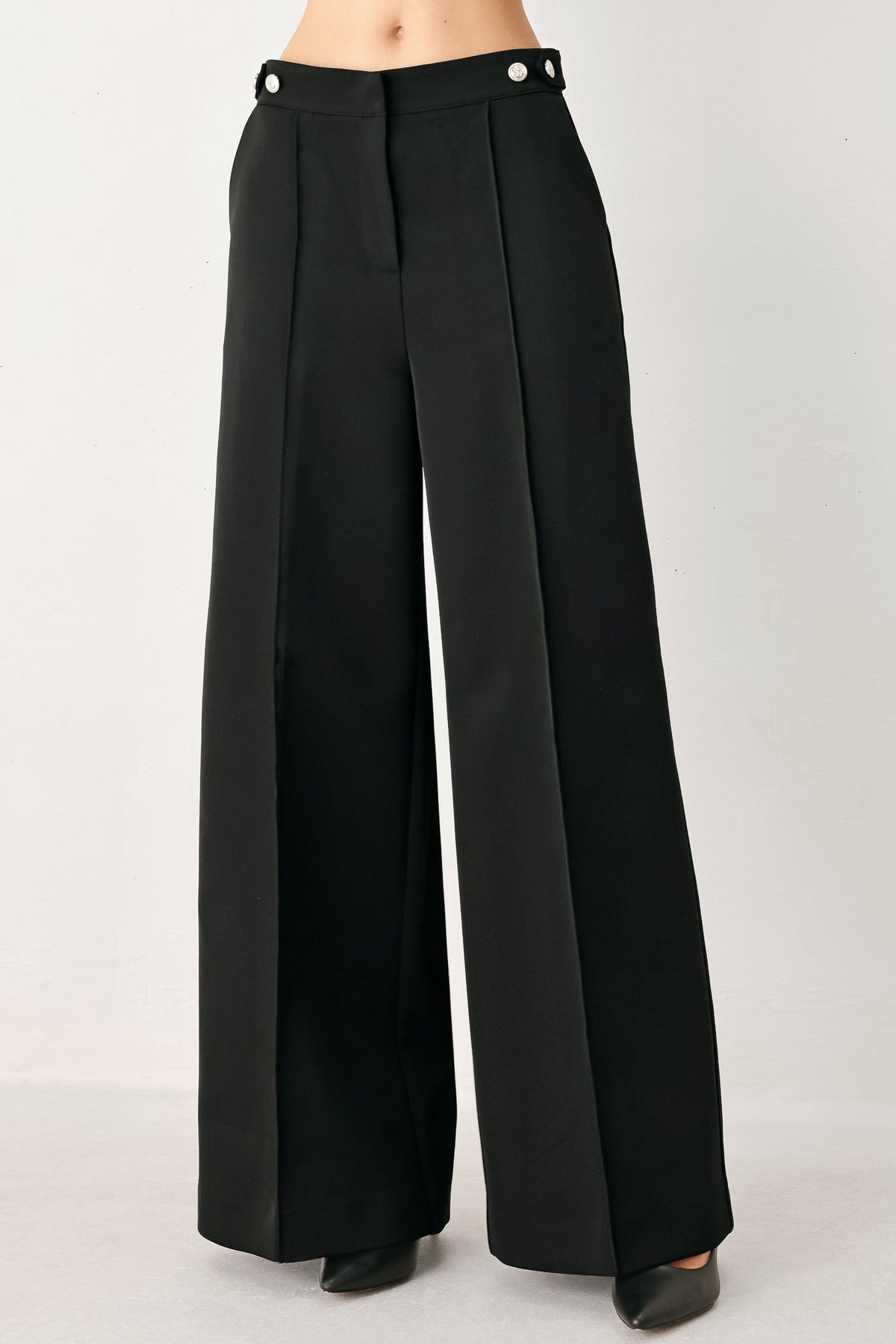 Black Power Palazzo woven pants by Flying Tomato, featuring wide-leg design and intricate woven patterns.