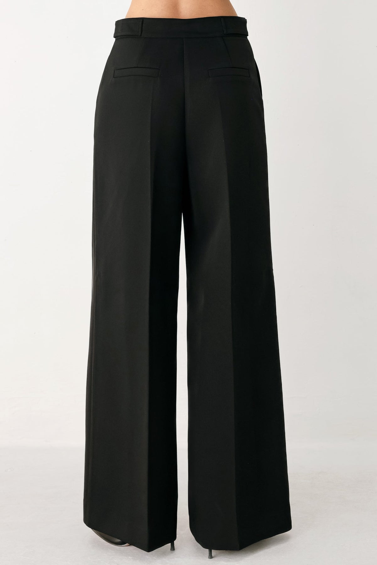 Black Power Palazzo woven pants by Flying Tomato, featuring wide-leg design and intricate woven fabric details.