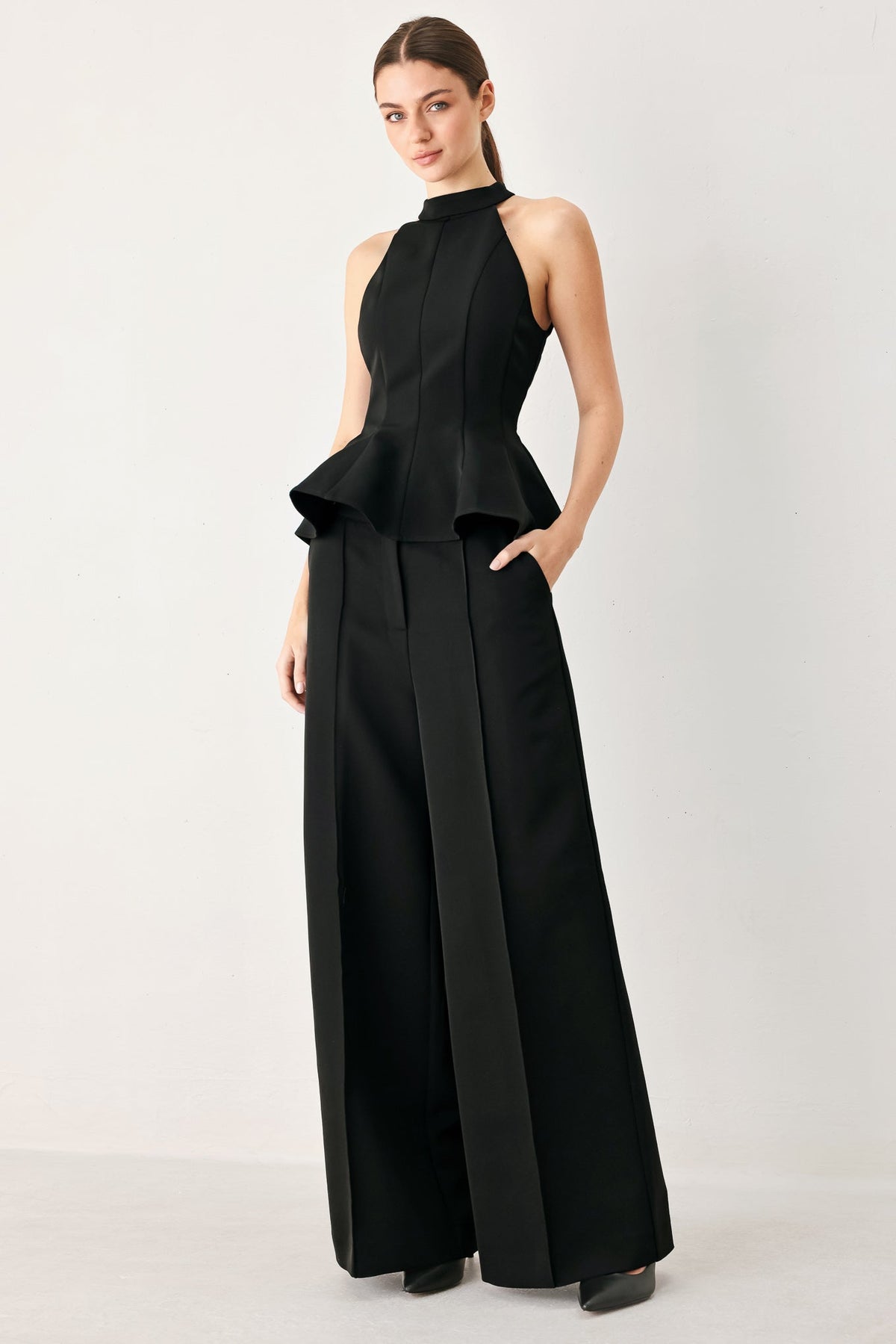 Black woven power palazzo pants from Flying Tomato featuring a flowing, wide-leg design and comfortable high-waist fit.
