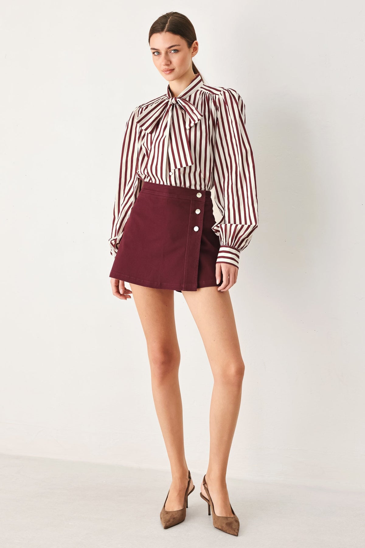 Flying Tomato Merlot Ridge woven skort in burgundy, with a comfortable waistband and stylish woven fabric design.